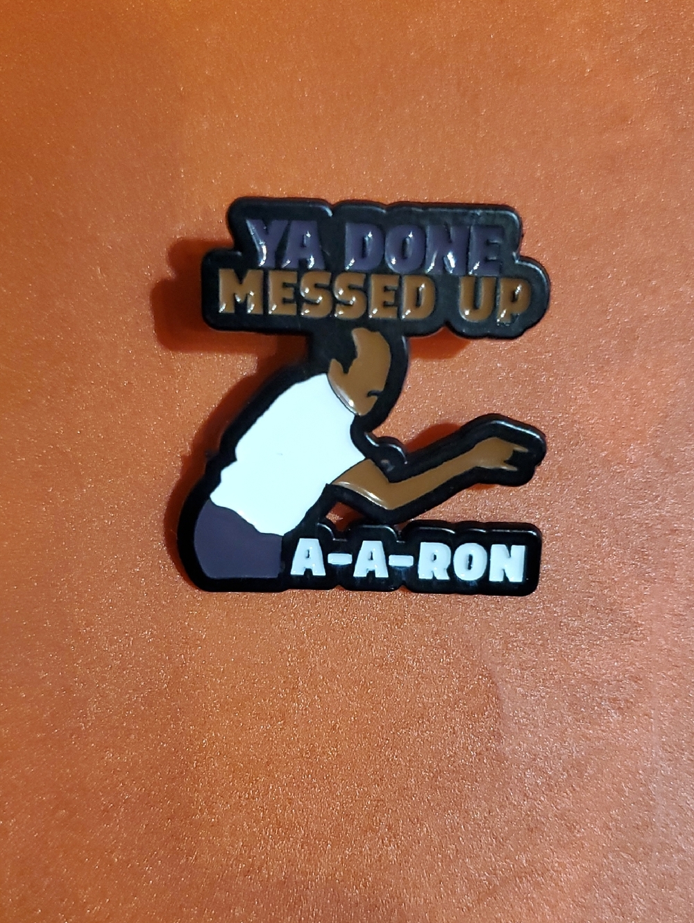 Stanley "Ya Done Messed Up A-A-Ron" Enamel Pin - Brown/White/Black